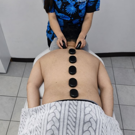 Masaje con Piedras Calientes